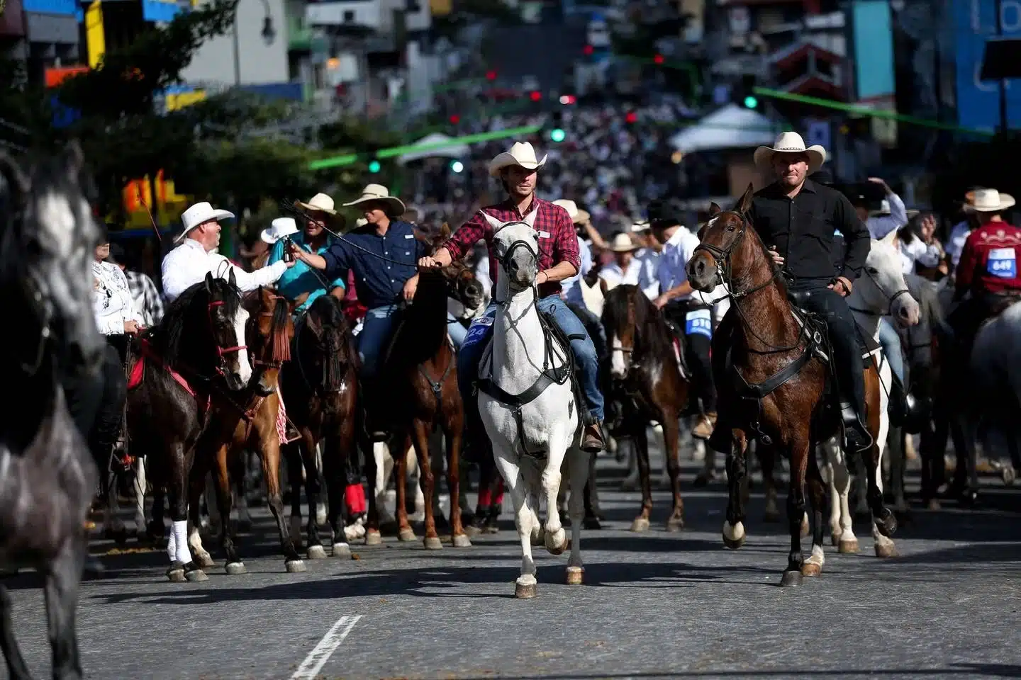 Experience the Tope Nacional, showcasing a horse parade and lively traditional music.