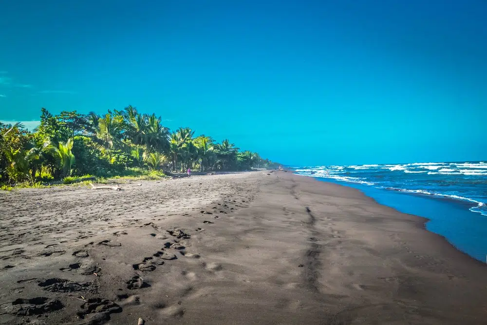 Book your getaway to Playa Negra, Costa Rica today and discover this black sand beach paradise!