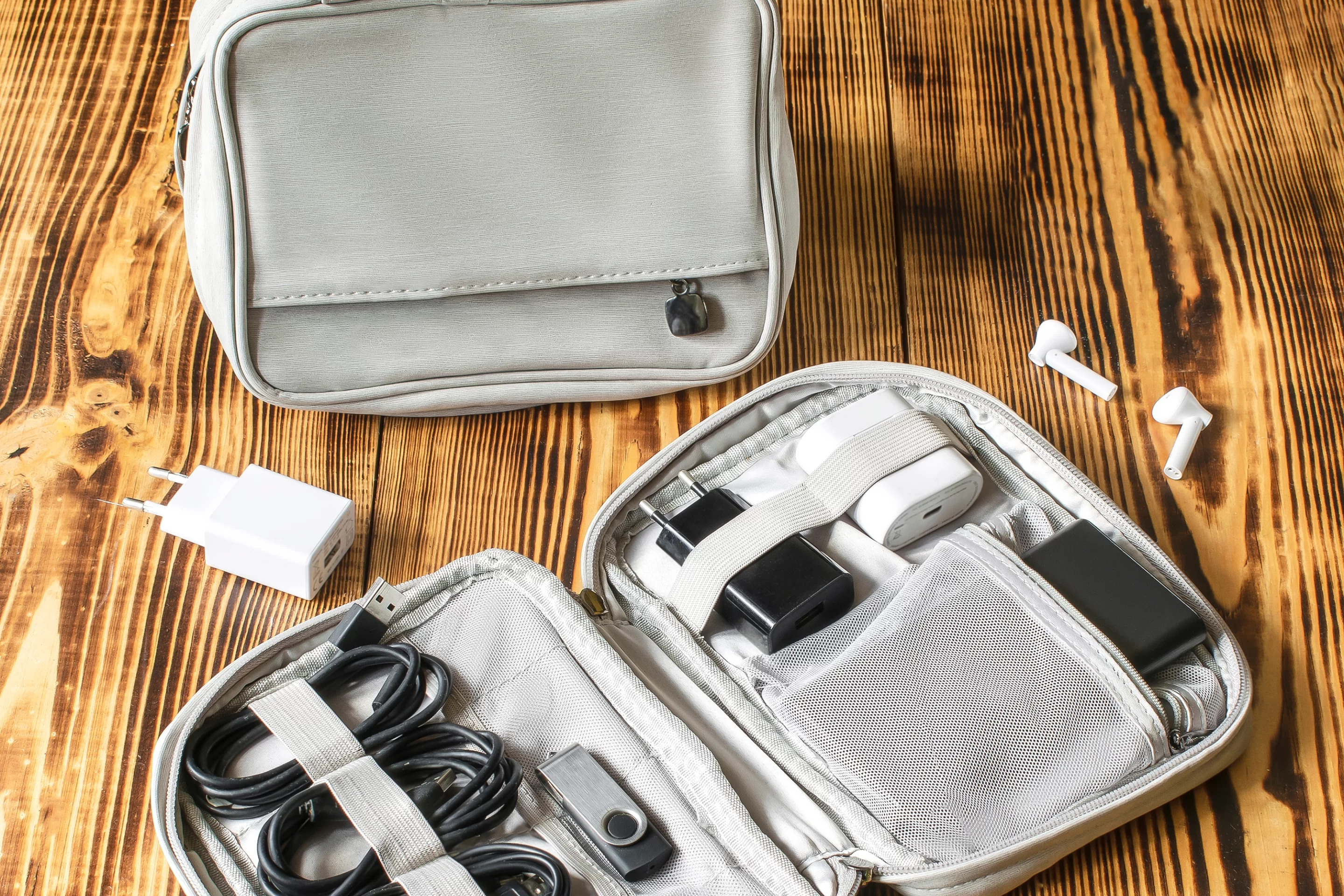 Stay connected and prepared with a portable charger, flashlight, and waterproof gear for your travels.
