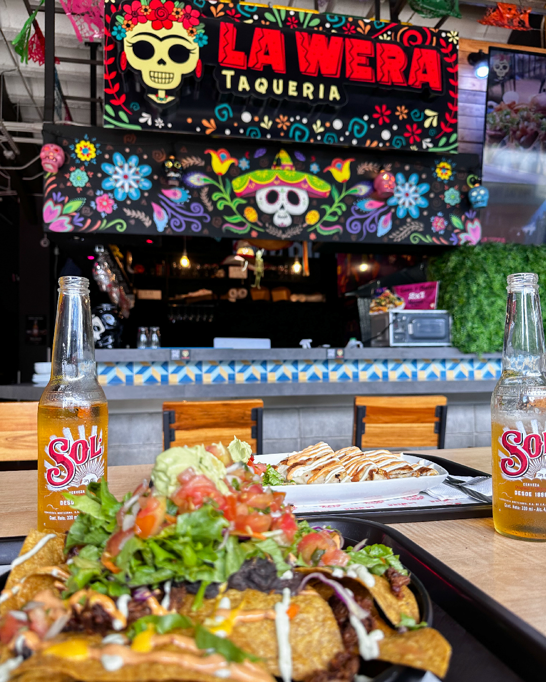 Amor de Barrio invites tourists to explore a vibrant culinary marketplace and bar food, right in the heart of San José.